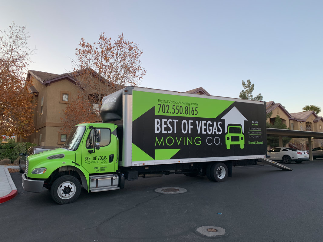 Best Of Vegas Moving Company's moving truck outside a residential area